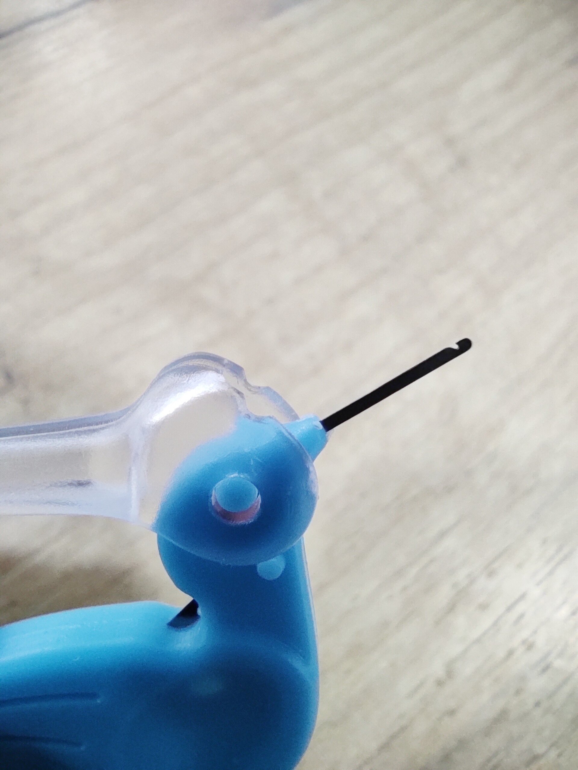 Enhebrador de agujas pájaro - 3